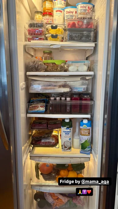 Stocked refrigerator with fruit, eggs, dairy, ferments and drinks.