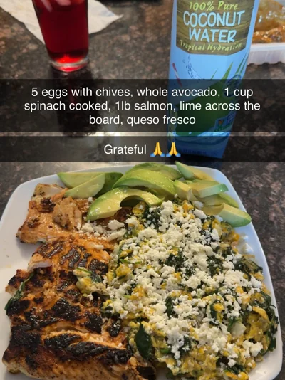 Salmon, eggs, spinach and avocado plate, coconut water and a Grateful overlay.